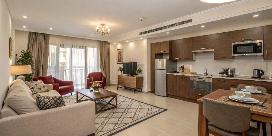 A side-by-side comparison showing a basically furnished room vs a fully equipped turnkey room