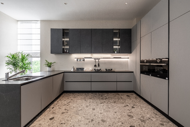 A picture of a melamine cabinet door with a chipped corner and another showing a swollen edge from water damage.